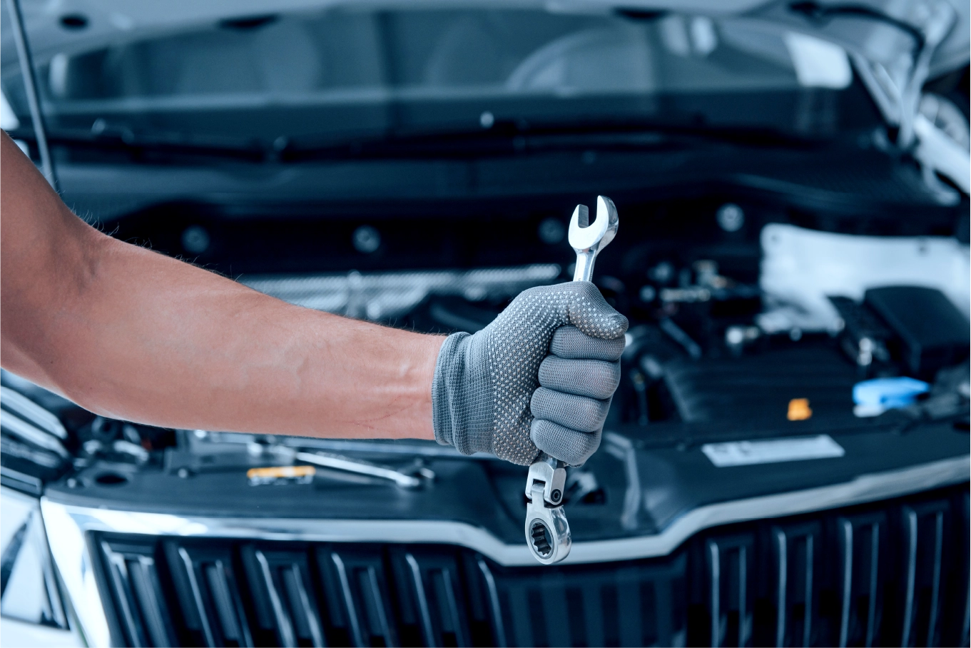 Mechanic Repairing Car